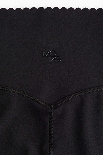 H&M Flared sports leggings in SoftMove™