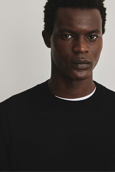 H&M سترة صوفية بقصّة عادية