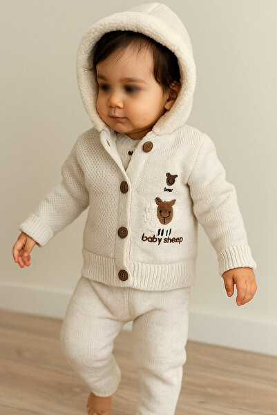 a baby Baby Knitting Set with Kuzu Lining