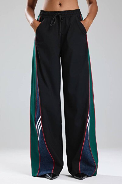 tw3 Γυναικείο παντελόνι από ύφασμα τζιν με λεπτομέρεια σχεδίασης με ρίγες