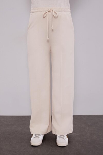 Levidor Bej Beli Lastikli Kuşgözü Detaylı Pantolon