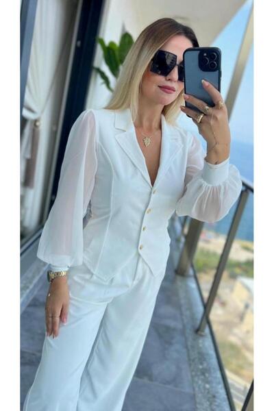 SEVA TEKSTİL بلوزة طويلة بأكمام بالون شفافة ومزودة بأصفاد إكرو