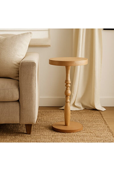 Vi Markets A round side table with an elegant wooden design and a carved base adds a warm and classic touch to the decor.