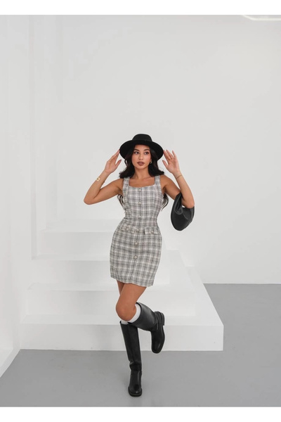 Vona Nova Sleeveless, button-down dress in a lightweight, white fabric. style number: h265007.