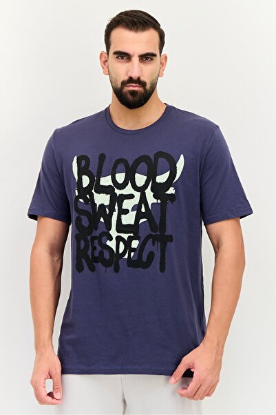 Under Armour تي شيرت رجالي فضفاض بأكمام قصيرة مطبوع عليه رسومات جرافيكية للاس...