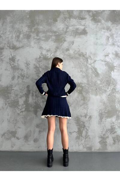 LE CARAMBOLE Жіночий синій поло з коміром-стійкою та спідницею з стрічками