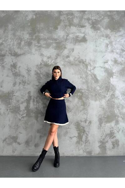 LE CARAMBOLE Жіночий синій поло з коміром-стійкою та спідницею з стрічками