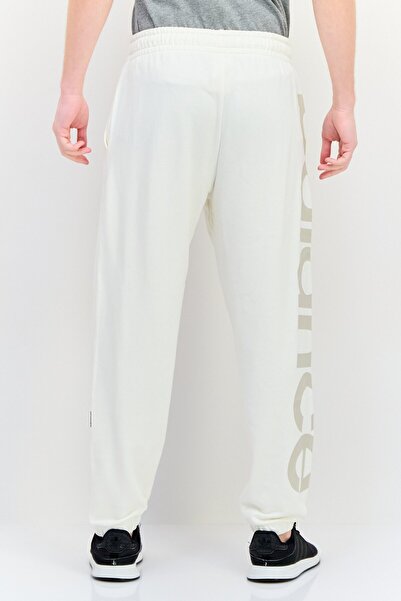 New Balance Men Brand Logo Drawstring Outdoor Sweatpants, Cream