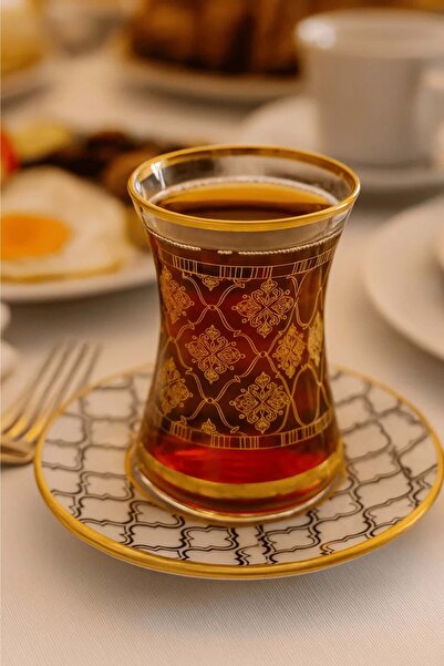 Jenisa 12 Piece Gold Gilt Patterned Tea Cup and Patterned Saucer Set