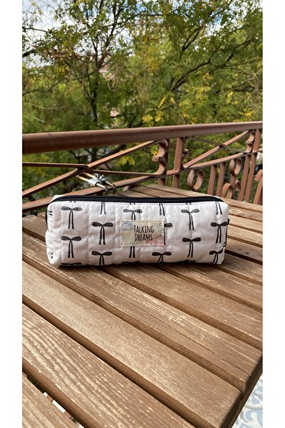 TALKING DREAMS Quilted Pencil Case with Black Ribbon Pattern