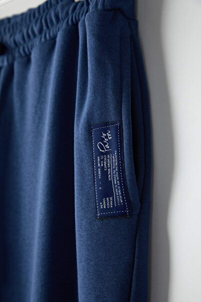 Trendyol Curve Φούτερ με λεπτομέρεια Indigo Label με φαρδύ πόδι/φαρδύ πόδι μεγάλου μεγέθους TBBAW26AJ00010