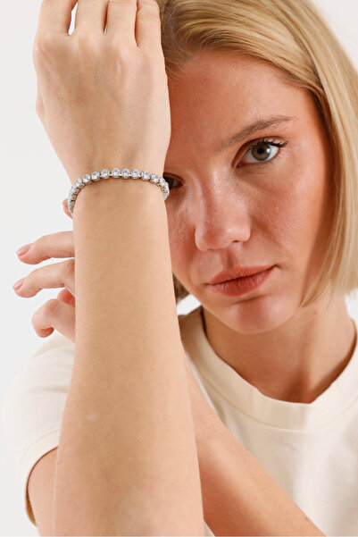 Swaroski ICONIC Flow Stream Zirkon taşlı, paslanmaz çelik gövde — uzun kullanım