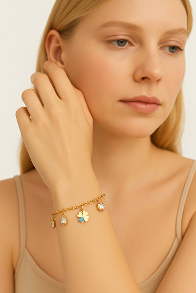 PİRLENTO سوار نسائي من الفولاذ باللون الذهبي مزين بالخرز على شكل برسيم