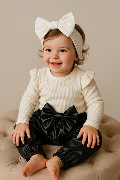 özge başaran Kız Çocuk, Siyah Deri Fiyonk Detaylı Pantolon, Krem Omuzu Fırfırlı Badi Ve Saç Bandı Takımı.