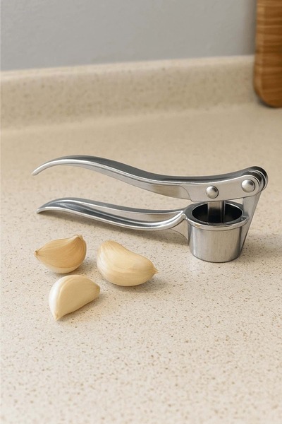 Jenisa مطحنة الثوم المصنوعة من الفولاذ المقاوم للصدأ المتين - مبشرة الثوم العملية