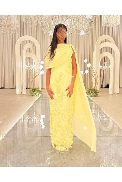 Generic Yellow evening dress embroidered with flowers and an elegant side shawl