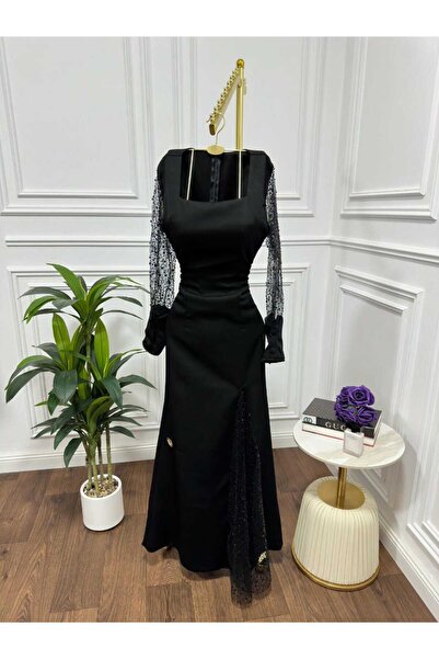Riva Long and elegant black evening dress