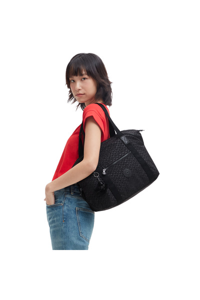 Kipling توقيع فني منقوش