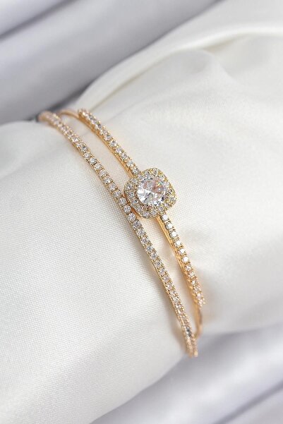 Inure Jewelry سوار نسائي من النحاس مرصع بحجر الزركون موديل باجيت ذهبي اللون