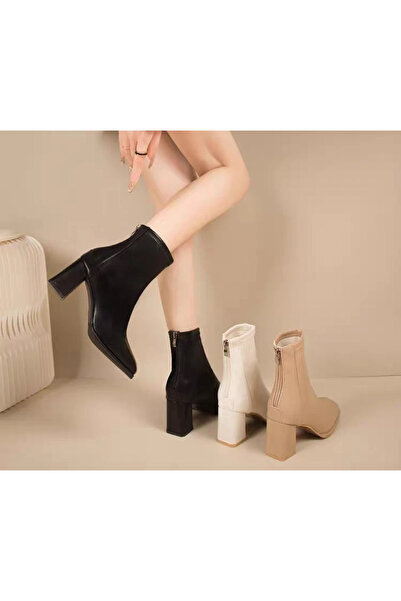 1way "Elegant women's boots with a wide heel and a modern touch"