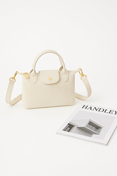 Handley ليليانا – حقيبة يد وكتف من الجلد السويدي مع تفاصيل جلدية