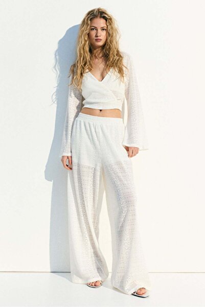 H&M بلوزة ملفوفة مقصوصة