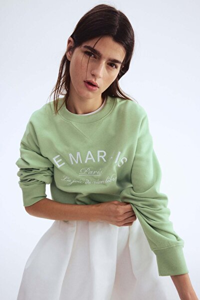 H&M سويت شيرت بنقشة نصية