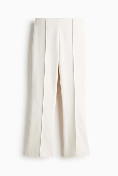 H&M Flared crease-front trousers