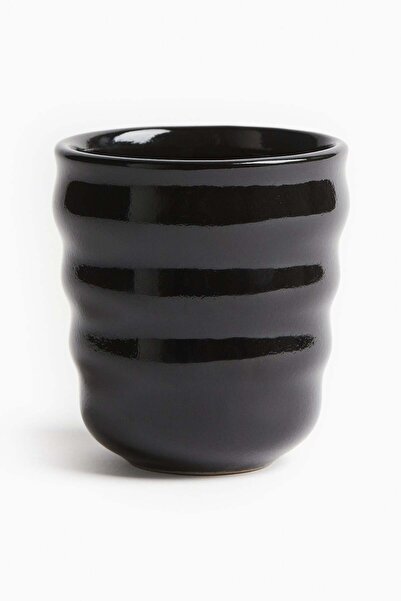 H&M كوب من الفخار المزخرف