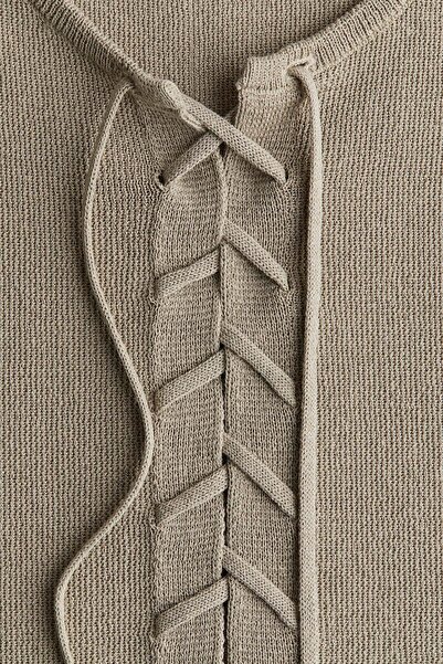 H&M صدرية بتفاصيل رباط