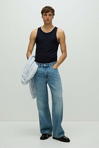 H&M قميص صدرية مضلعة بقصّة Slim Fit