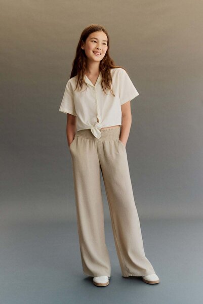 H&M Smocked crinkled trousers