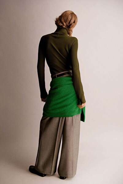 H&M بلوزة محبوكة بسحّاب من الأعلى