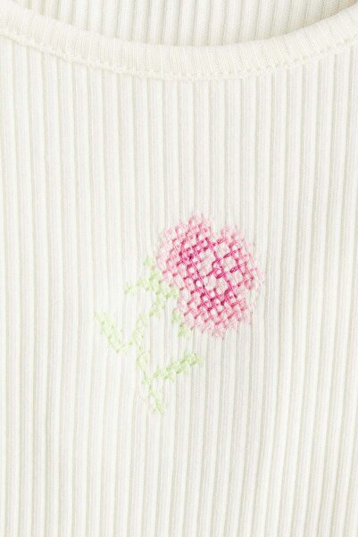 H&M بلوزة بنقشة مطرزة