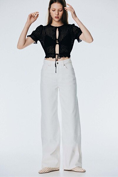 H&M بلوزة قصيرة محبوكة