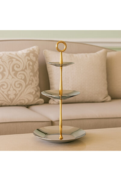 Dania A luxurious 3-tier presentation stand made of shiny silver and gold metal with an elegant and modern design that reflects luxury.