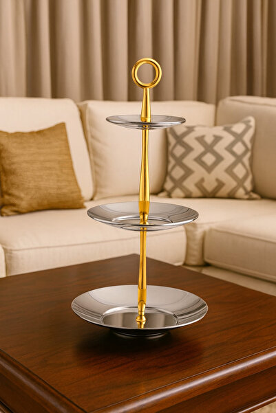 Dania A luxurious 3-tier presentation stand made of shiny silver and gold metal with an elegant and modern design that reflects luxury.