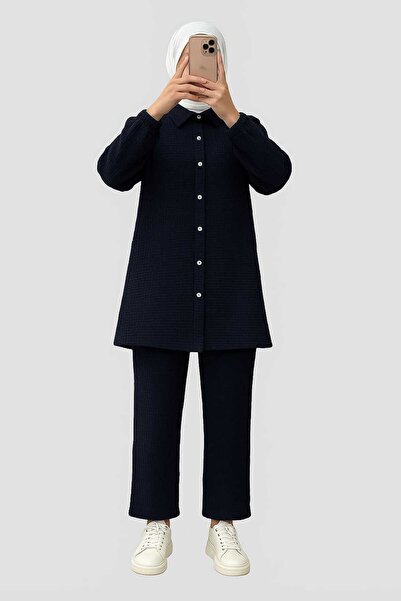 tesettürgiyim فستان نسائي من قماش البروميكوك مع تفاصيل الأزرار