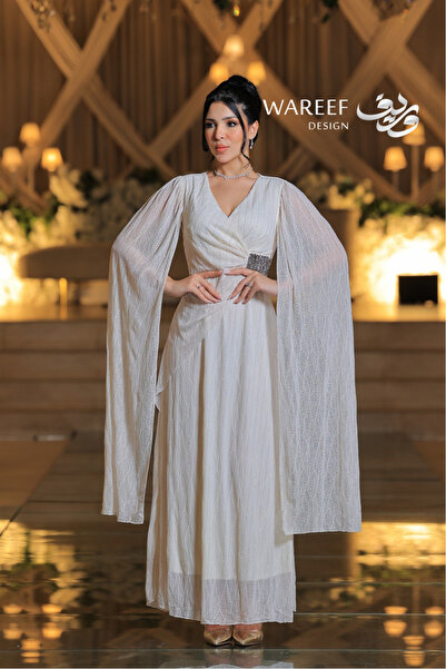 WAREEF FASHION Royal white long dress with cap sleeves and stunning crystal e...