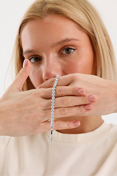 Swaroski ICONIC Flow Stream Zirkon taşlı, paslanmaz çelik gövde — uzun kullanım