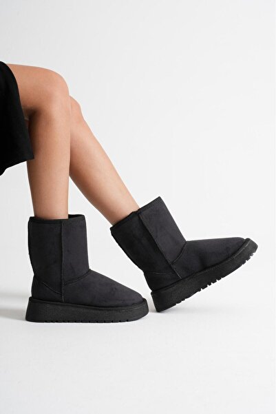 marceline حذاء نسائي طويل من جلد الغزال الأسود مع فرو من الداخل ونعل سميك من ...