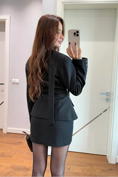 FMN Moda High-Waisted Mini Skirt with a Fitted Waist, Cross-Button Neckline, and Belt Design Blazer Jacket, a Stylish Two-Piece Set.