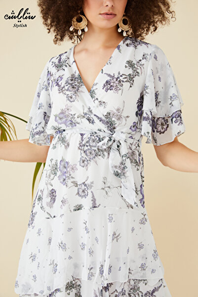 Stylish White floral v-neck midi dress with ruffle design