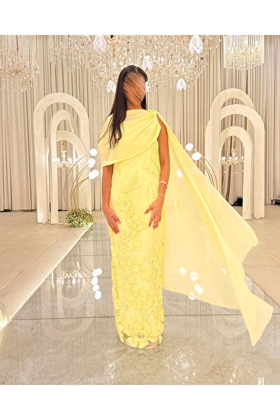 Generic Yellow evening dress embroidered with flowers and an elegant side shawl