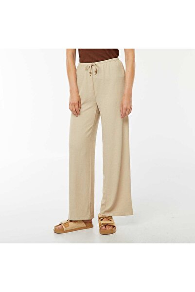 KIABI Waffle-knit wide-leg trousers BEIGE