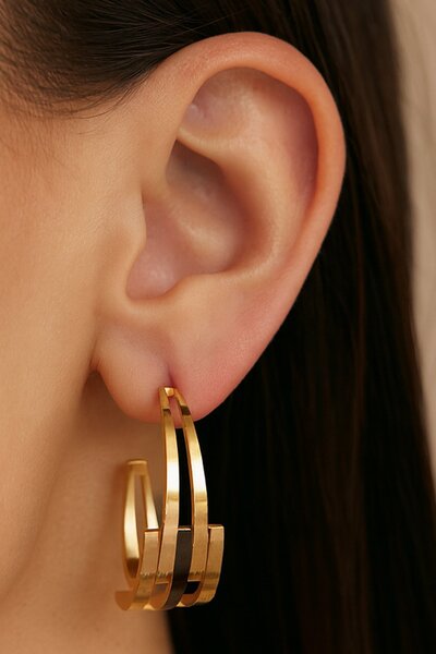 TAKIŞTIR أقراط دائرية من الفولاذ باللون الذهبي (زوج)