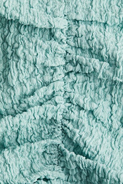 H&M الجزء العلوي منسدل المحكم