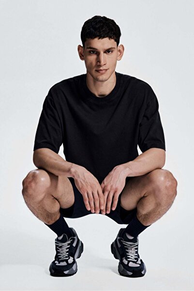 H&M Boxy-style sports top with DryMove™