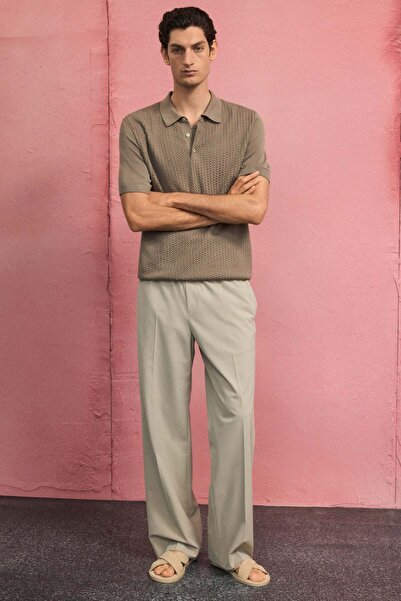 H&M قميص بولو بقصّة Slim Fit من نسيج الكابل