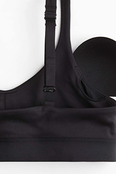 H&M قميص رياضي مع DryMove™